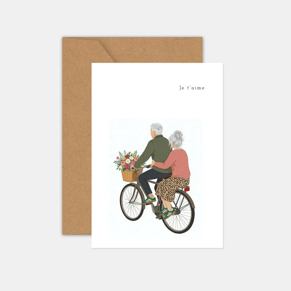 Carte couple sur un vélo